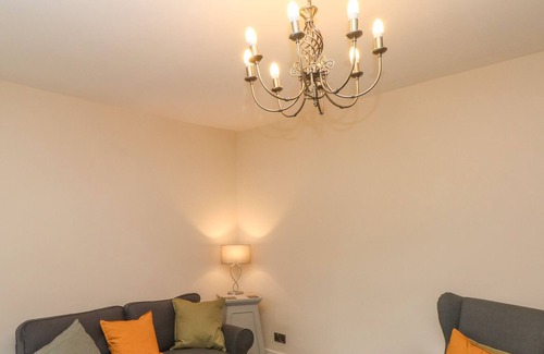 Oldham Cottage | 10 WEST COTTAGES, pet friendly, with open fire in Greenfield