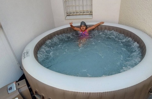 Bellevue House | Relaxing Family Retreat with Pool, Spa & Hot Tub Access