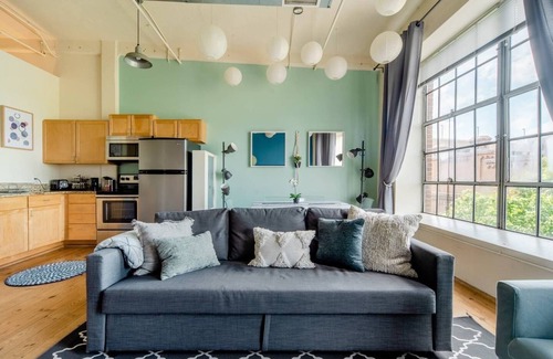 Downtown Apartment | Historic 2BR Loft with Pool & Pet-Friendly Amenities