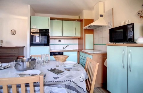 Reberty Apartment | Exceptional Stay at Les Menuires with Spa & Kitchen Amenities