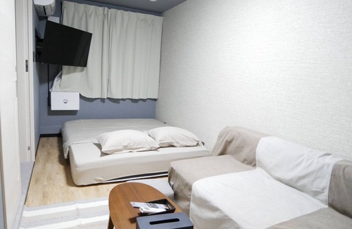 Amami Hotel | Exceptional HOOD Inn: Private Sauna & Family-Friendly Stay