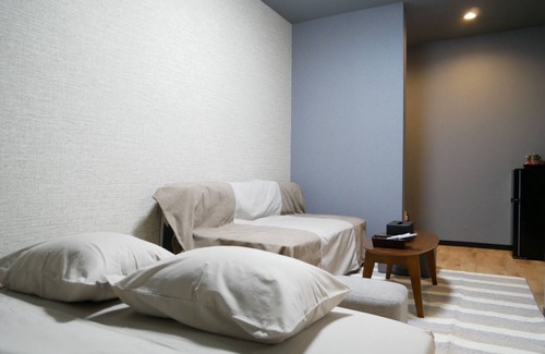 Amami Hotel | Exceptional HOOD Inn: Private Sauna & Family-Friendly Stay