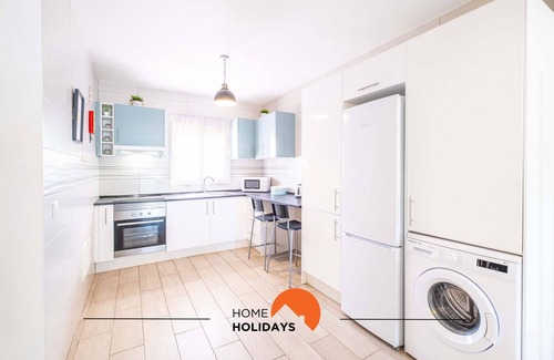 Areias de Sao Joao Apartment | New Town Retreat: Shared Pool, Balcony & Top-Rated Stay