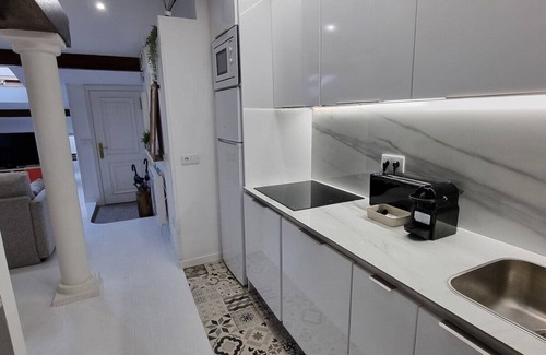 Gijon City Centre Apartment | Discover Begoña de mis amores: Spa & Family-Friendly Retreat
