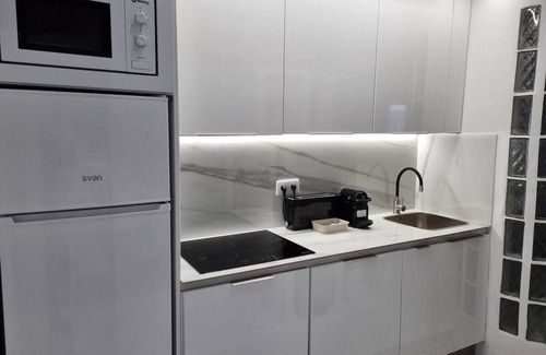 Gijon City Centre Apartment | Discover Begoña de mis amores: Spa & Family-Friendly Retreat