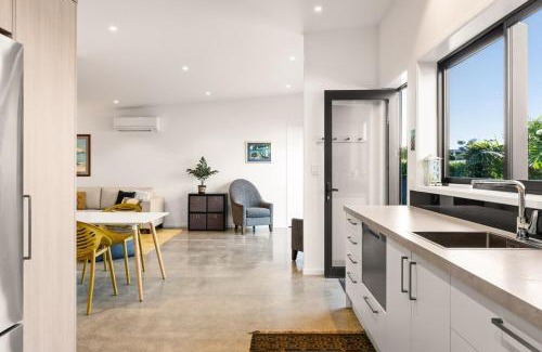 Wainui Apartment | 120m to Wainui Beach - Modern Coastal Unit