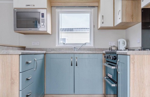Skegness House | 12ft-wide very comfortable and spacious caravan with one double and one twin.