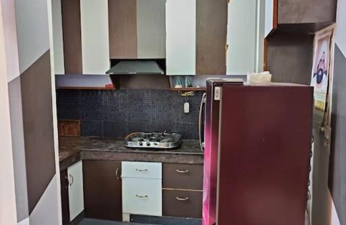Greater Noida Apartment | City View 2BHK with Convenient Parking and Breakfast