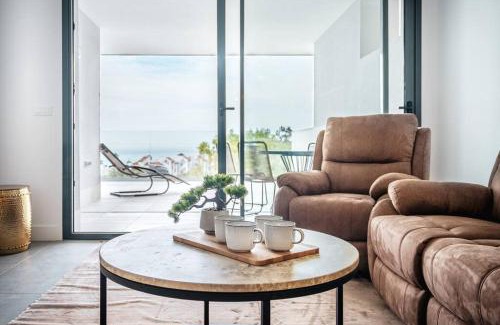 Alcorrin Apartment | Modern Apartment with Terrace, Sea View & Jacuzzi in Manilva