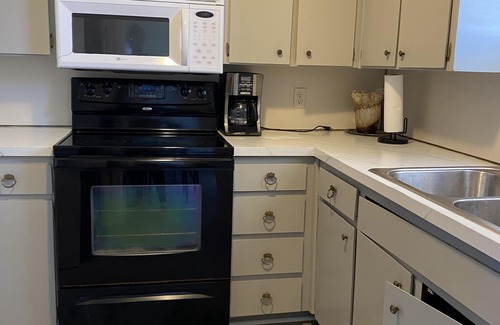 Arlington Apartment | Convenient Stay: Poolside Retreat Near Beach & Town