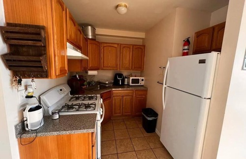 Queens Apartment | Convenient Stay: 15 Mins to Manhattan with Balcony Access