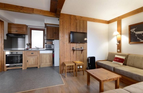 Montchavin Apartment | Cozy Retreat Near Ski Slopes with Balcony & Fireplace