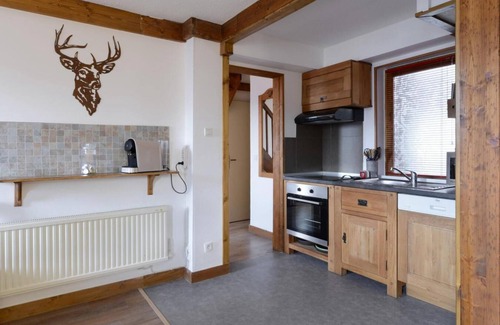 Montchavin Apartment | Cozy Retreat Near Ski Slopes with Balcony & Fireplace