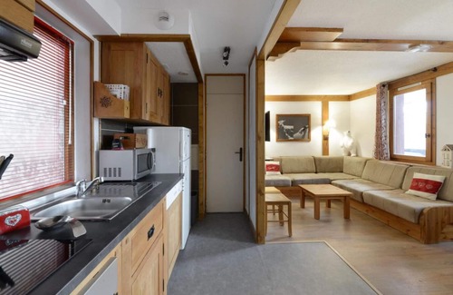 Montchavin Apartment | Cozy Retreat Near Ski Slopes with Balcony & Fireplace
