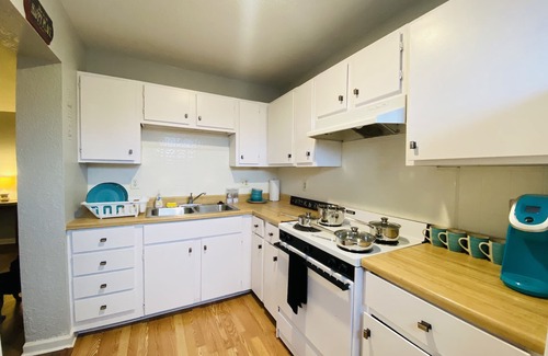 Grain Valley Apartment | Ideal Location: Walk to Bars, Close to Stadiums & Amenities