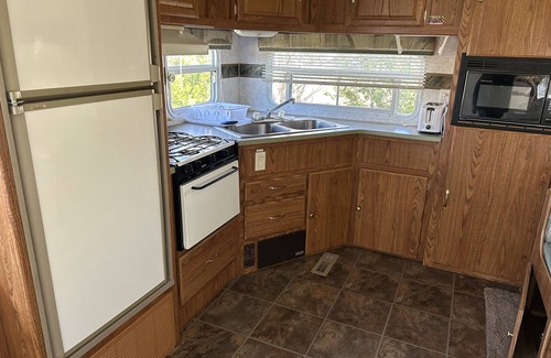 Stokes Bay House | Inviting Camping Retreat with Scenic Waterviews