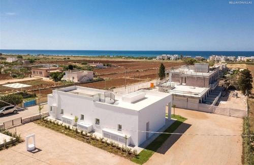 Torre Pali House | Indulge in Garden Suites at 1664 Perla Saracena
