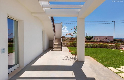 Torre Pali House | Indulge in Garden Suites at 1664 Perla Saracena