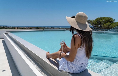 Torre Pali House | Indulge in Garden Suites at 1664 Perla Saracena