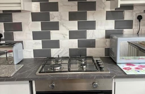 Prestatyn House | Pet-Friendly 2-Bed Bungalow with Hot Tub & Gym Features