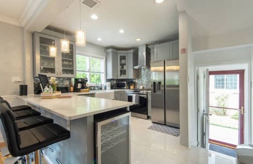 Baldwin House | Unwind Near UBS Arena: Hot Tub, Game Room & King Bed