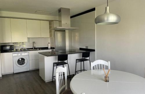 Distrito Sur Apartment | Modern 173A Apartment: Family-Friendly Retreat with Top Ratings