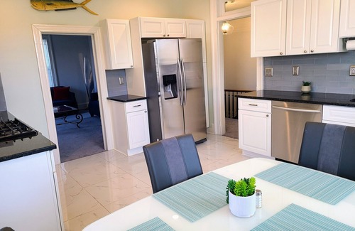 Woodbridge Apartment | Experience 1876 Historical Manor with Oceanfront Bliss