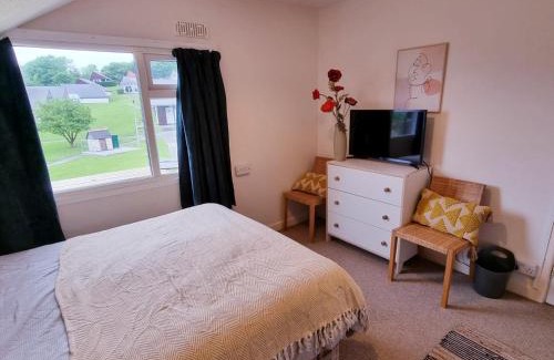 Bude House | Discover 19 the Coombe: Family-Friendly Retreat with Pool