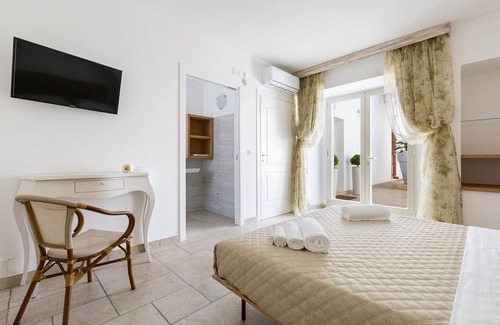 Pittuini Bed & Breakfast | Experience 1911 B&B I Tarocchi: La Luna Room Awaits