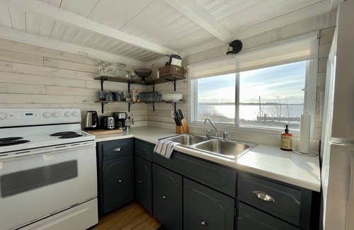 Port de Grave House | Oceanfront 1919 Fishermans Cottage with Family-Friendly Amenities