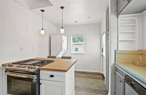Tustin House | Elegant 1920's Spanish Revival Home with Ocean View & Spa