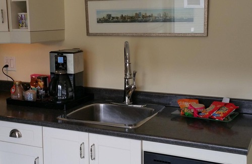 North End Apartment | Charming 1930's Boutique Loft with Canopy Beds & Ocean View