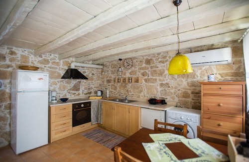 Sivas Apartment | Charming 1936 Stone Apartment with Pool in Crete