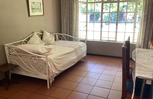 Potchefstroom Apartment | Classic 1950's Retreat with Pool & Pet-Friendly Amenities