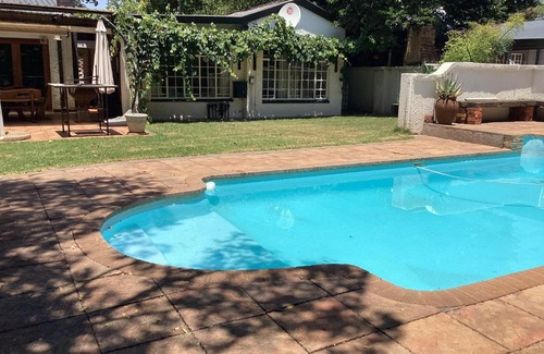 Potchefstroom Apartment | Classic 1950's Retreat with Pool & Pet-Friendly Amenities