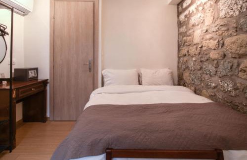 Kalambaka Apartment | Relax at 1951 Suites - Oceanfront Standard Room Awaits