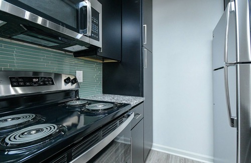 Buford Highway Apartment | Cozy 1BD Retreat with Breakfast & Family-Friendly Options