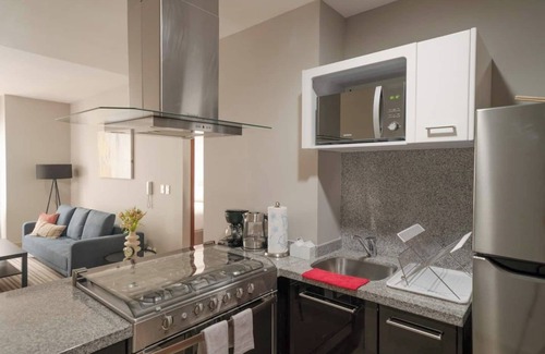 Ampliacion Granada Condo | Relaxing 1BR Apartment with Pool, Gym & High-Speed WiFi