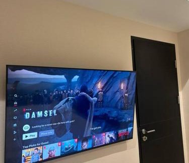 Bumi Serpong Damai Apartment | Stylish 1BR Branz BSD: PS5, King Bed & OLED TV Await!