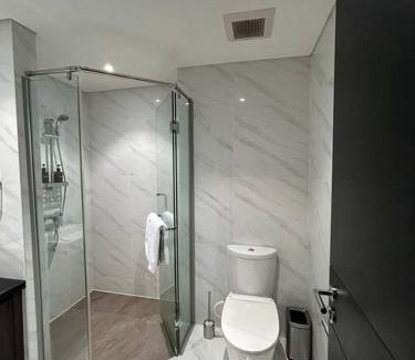 Bumi Serpong Damai Apartment | Stylish 1BR Branz BSD: PS5, King Bed & OLED TV Await!