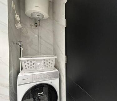 Bumi Serpong Damai Apartment | Stylish 1BR Branz BSD: PS5, King Bed & OLED TV Await!