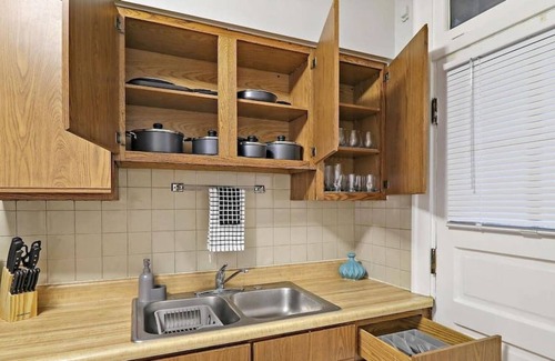 Cragin Apartment | Modern 1BR Apartment with Kitchen and Laundry Facilities