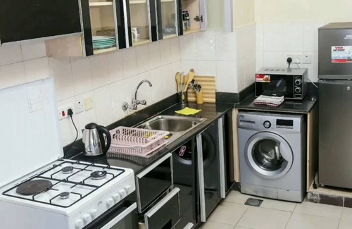 Nairobi Apartment | Convenient 1BR Retreat with Pool & Spa Near City Hotspots