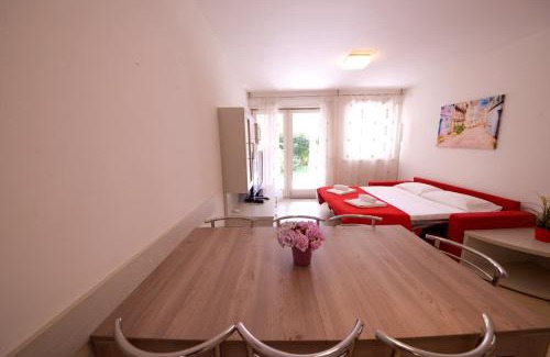 Riva del Garda Apartment | Relax in a Private Garden Retreat with Pet-Friendly Perks