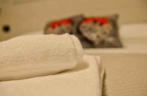 Riva del Garda Apartment | Relax in a Private Garden Retreat with Pet-Friendly Perks