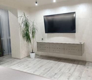 Khmelnitskiy Apartment | Elegant 4-Star Suite: Rated 10/10 & Family Friendly