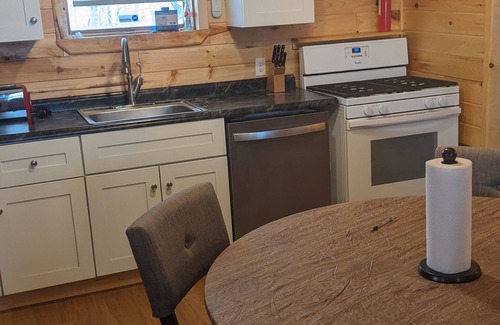 South Rutland House | Top-Rated Tug Hill Snowmobile Camp: Pet-Friendly Retreat