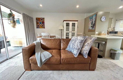 Epsom House | Inviting Flora and Fauna Unit with Garden & Deck Access