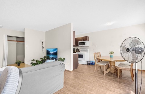 West Edmonton Apartment | Art District Gem: Entire Unit with Pool & Spa Amenities
