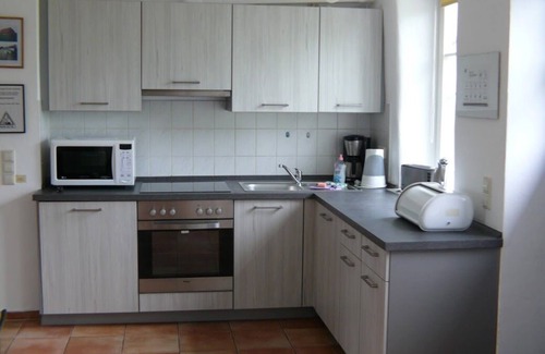 Muritz House | Cozy Lakeside Apartments with Fireplace and Sauna in Klocksin